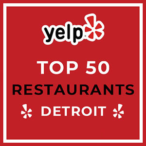Yelp Top 50 Restaurants in Detroit Award badge.