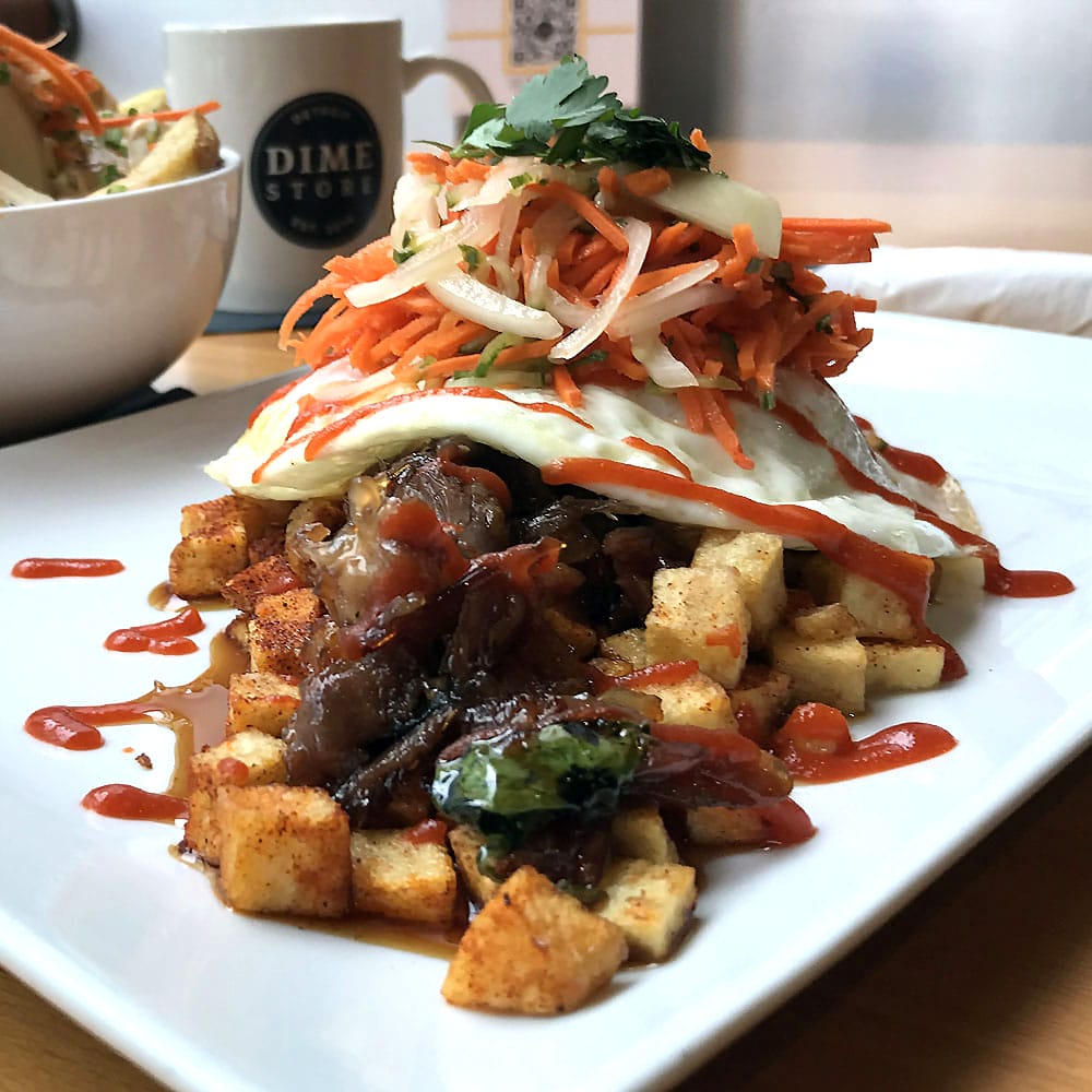 Duck Bop Hash with house-confit duck, a Dime Store original dish