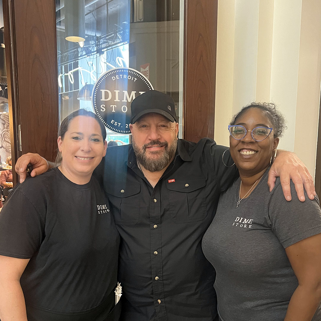 Kevin James poses with Dime Store Detroit staff during visit before Owls Don’t Walk comedy tour