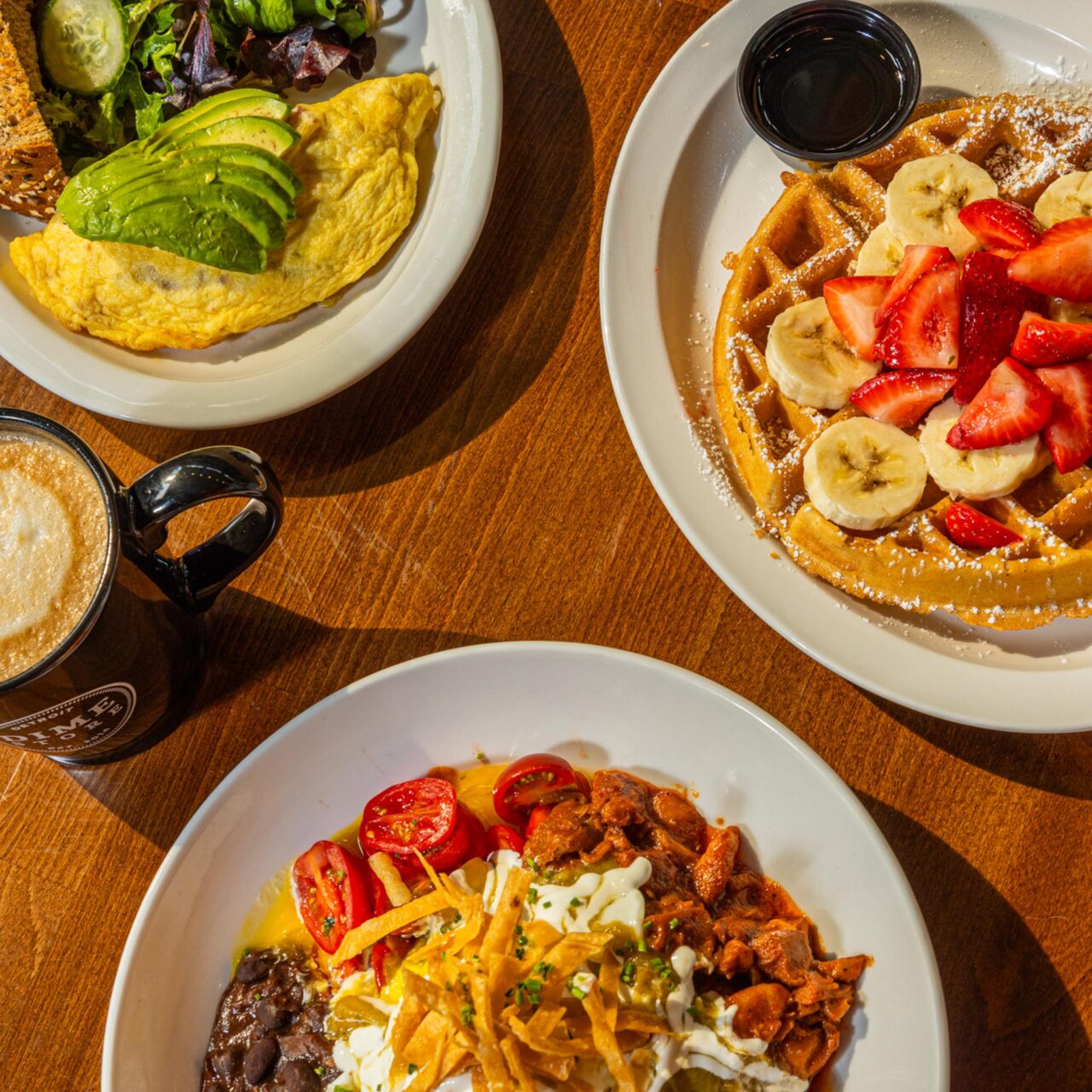 Omelettes, waffles, and bowls. All apart of Dime's brunch catering offer.