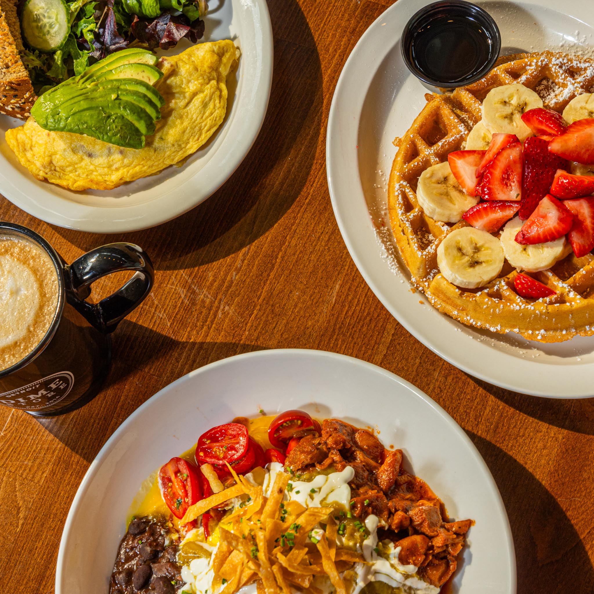 Omelettes, waffles, and bowls. All apart of Dime's brunch catering offer.