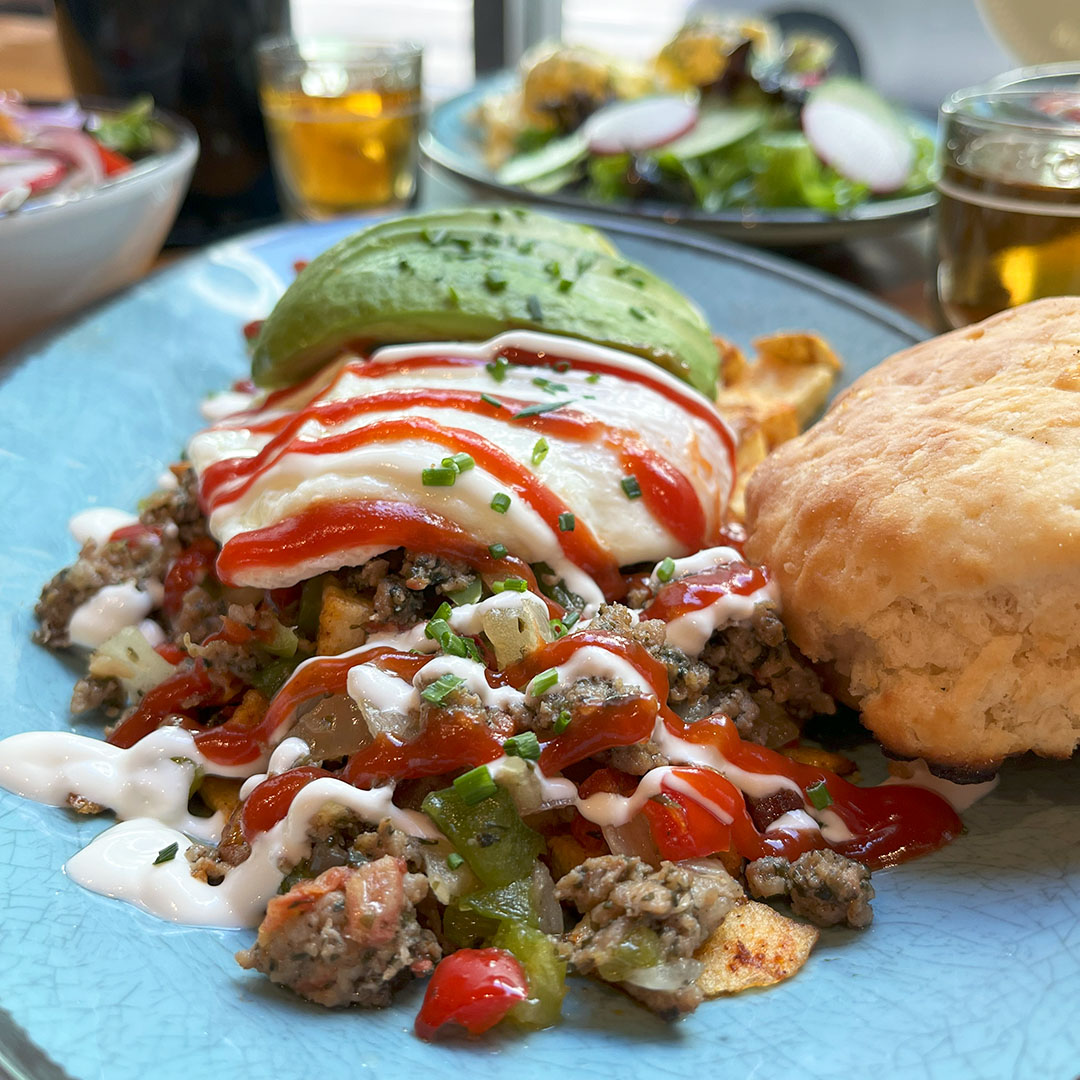 Dime Store's housemade sausage hash with fresh-baked buttermilk biscuit.