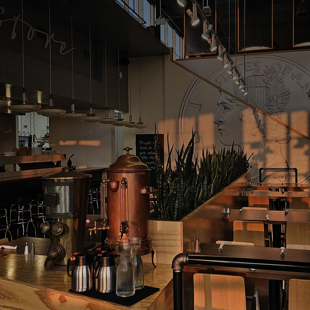 Morning sunlight inside the dining room at Dime Store Rochester Hills
